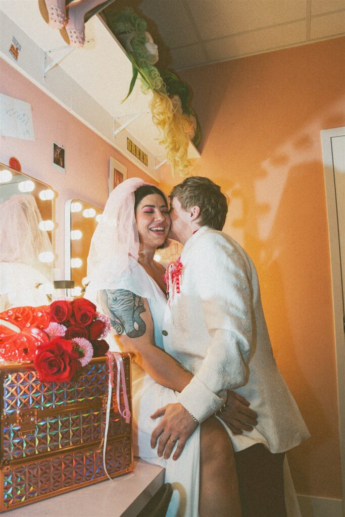 Vintage-inspired LGBTQ elopement celebration at The Pink Lantern, a coffee shop and cocktail bar in Birmingham Alabama.
