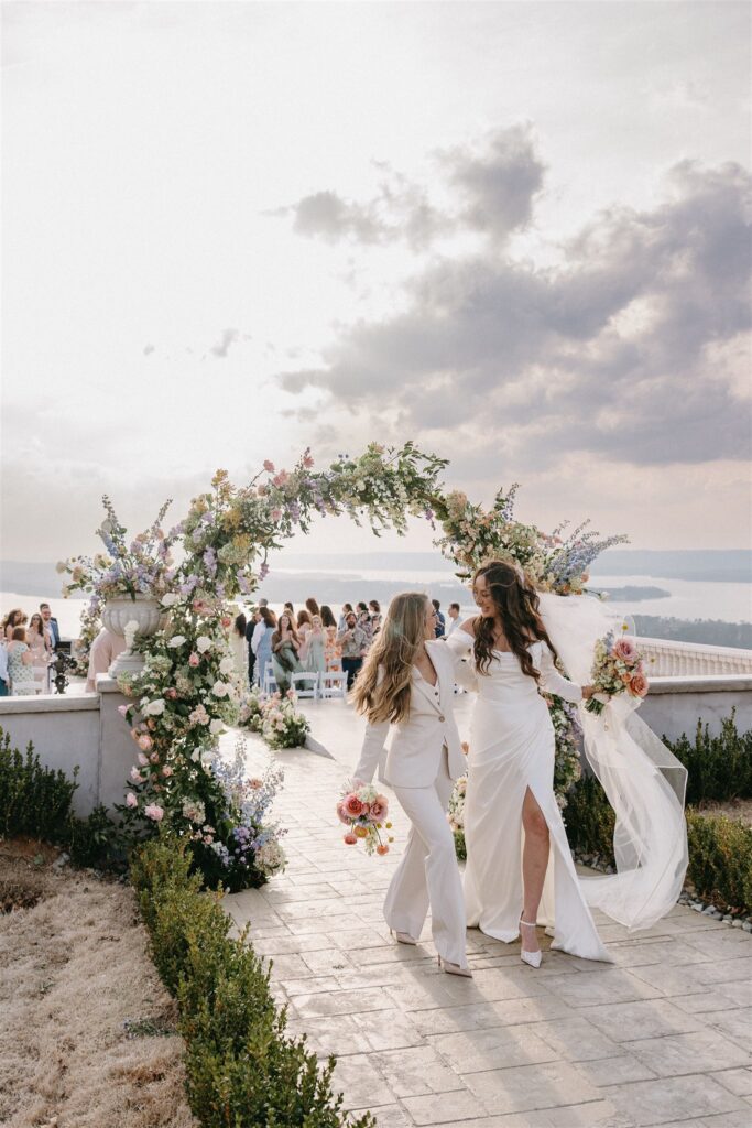 Brides exit their ceremony at a Section Alabama wedding venue 