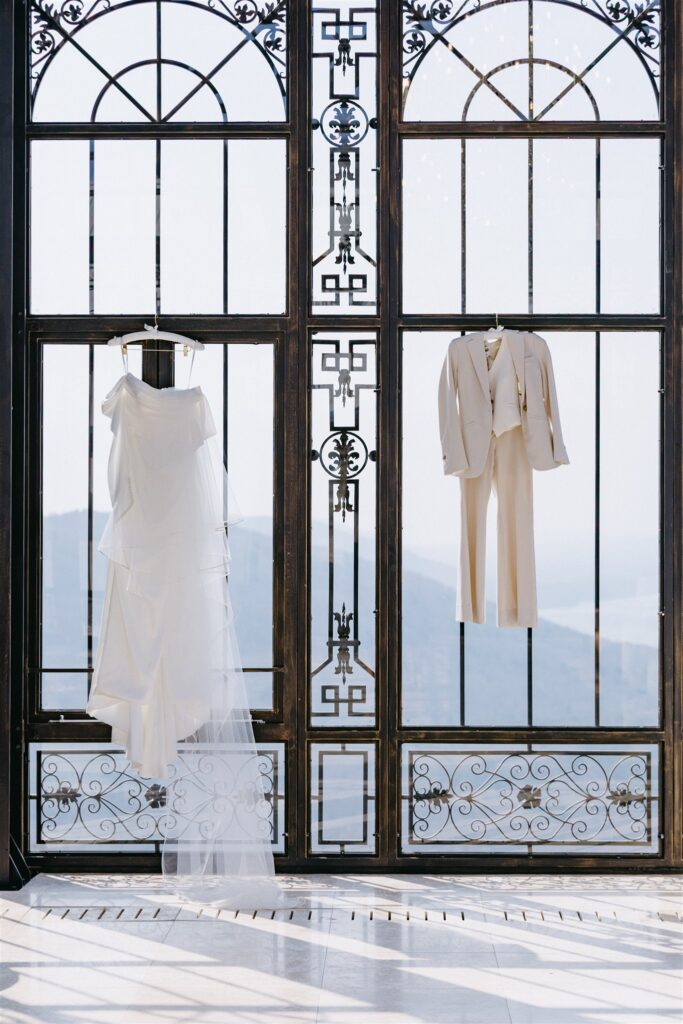 Wedding wardrobe is hung in the windows of The Atrium at a Stonehaven wedding 