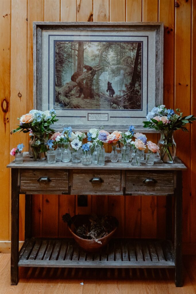 Colorful wedding florals are tucked into mason jars before a Pigeon Forge elopement. 