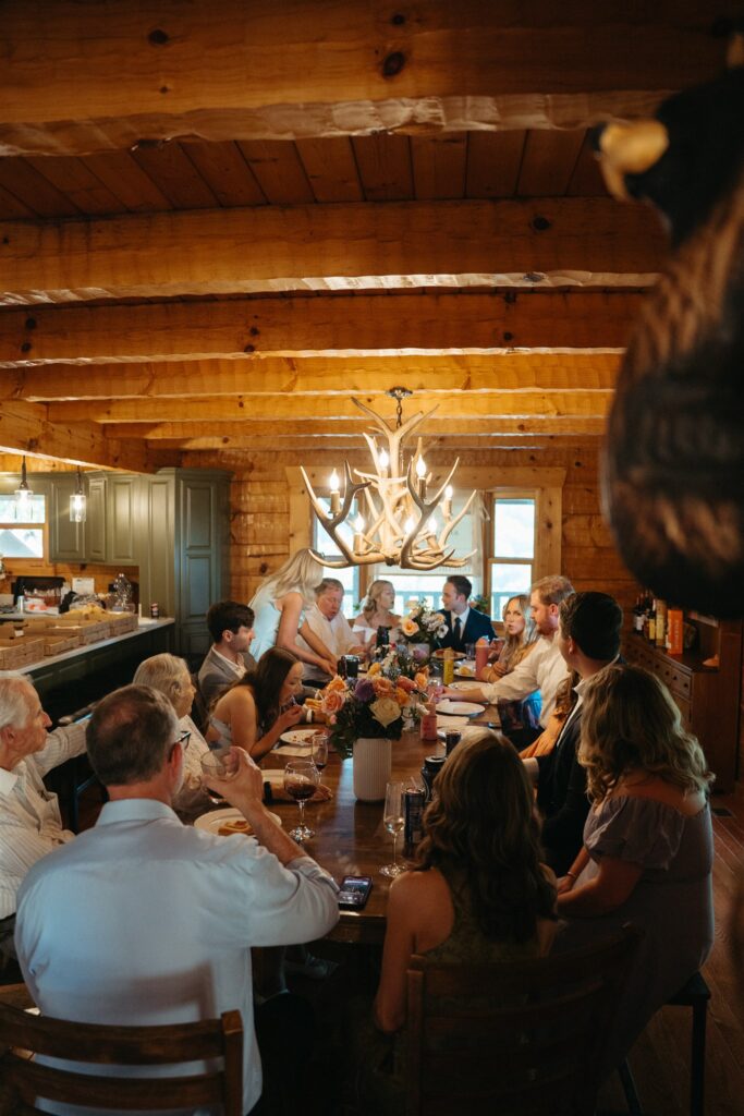 A Pigeon Forge elopement reception is photographed inside a Smoky Mountains cabin. 